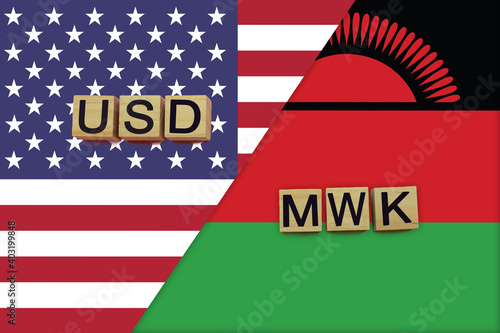 USA and Malawi currencies codes on national flags background photo