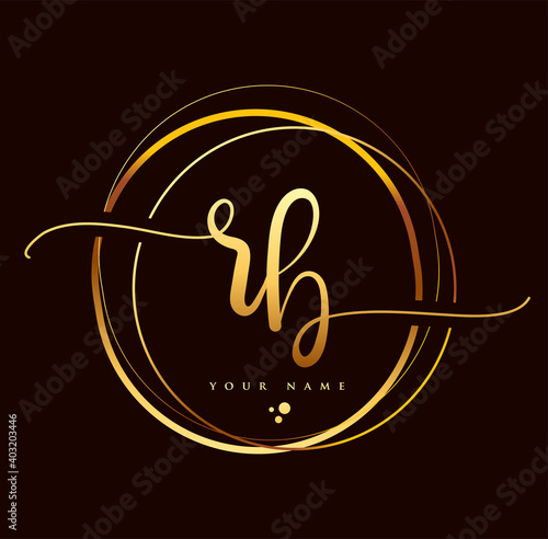 RB Initial handwriting logo golden color. Hand lettering Initials logo branding, Feminine and luxury logo design isolated on black background. photo