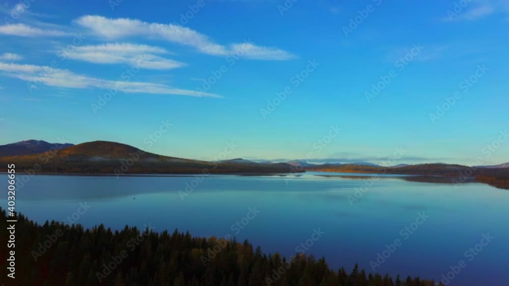 Aerial video of beautiful mountain lake on a frosty autumn morning Aerial video of beautiful mountain lake on a frosty autumn morning