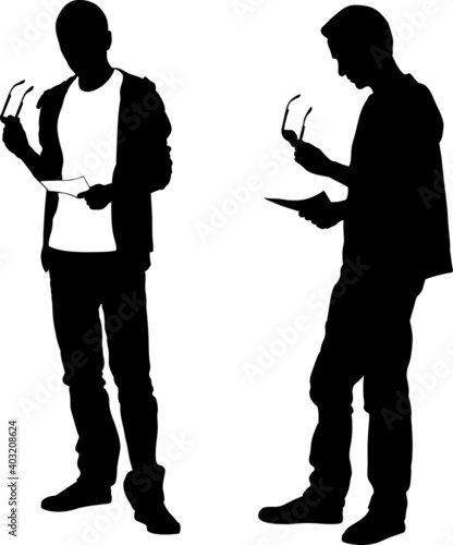 silhouettes of men reading a piece of paper
