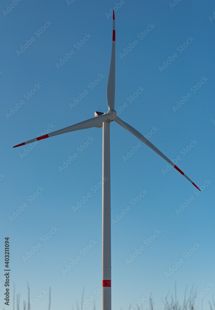 Wind turbines onshore at the North Sea coast Wind turbines onshore at the North Sea coast