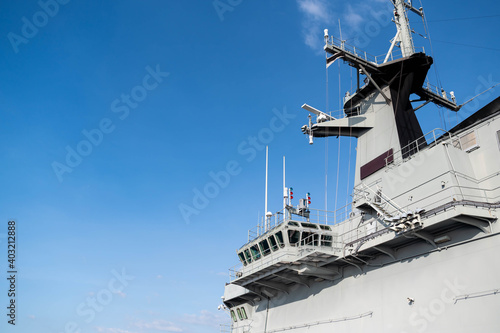 Fotografie The military navy ship or warship against the blue sky