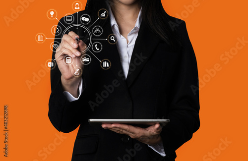 Digital marketing media in virtual icon globe shape business open his hand, working touch screen tablet.