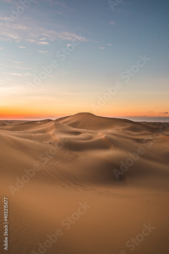 abu dhabi desert sunset