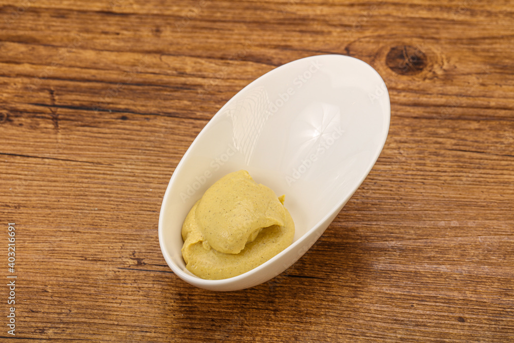 Dijon mustard sauce in the bowl Dijon mustard sauce in the bowl