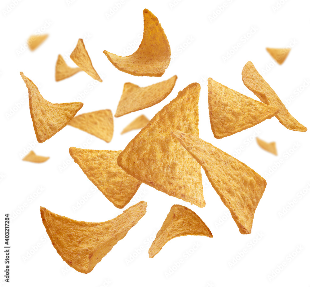 Fototapeta premium Corn chips of triangular shape levitate on a white background