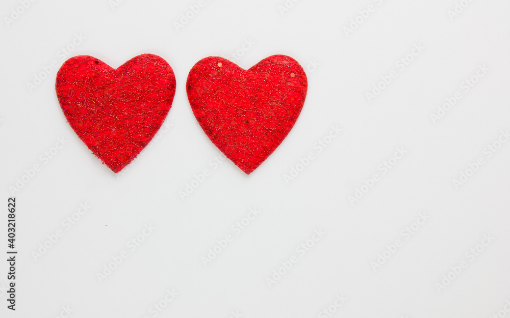 Red heart on a white background. Festive background. Minimalism. Copy space. St. Valentine's Day background