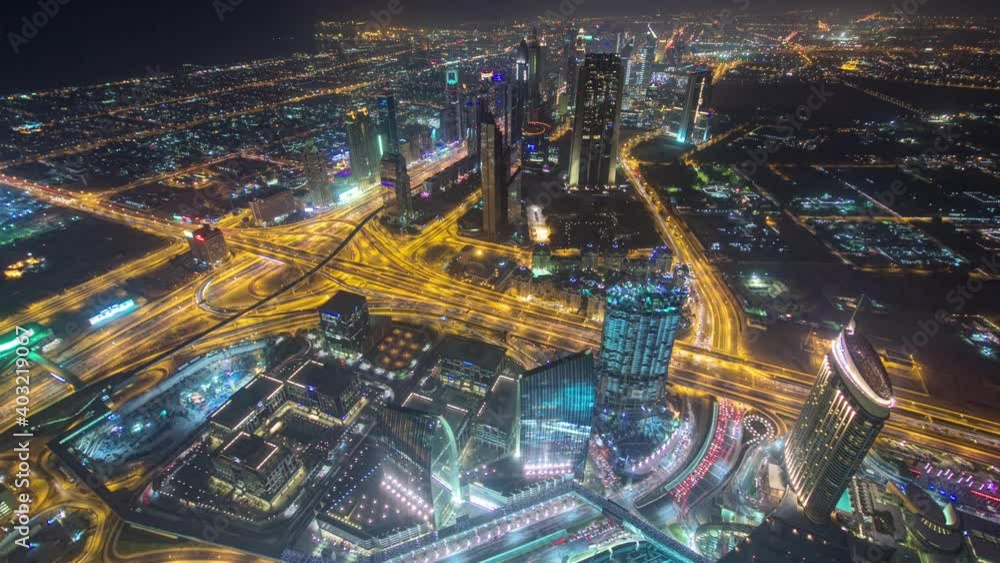 Dubai downtown skyscrapers day to night transition timelapse with city lights aerial view from viewpoint, luxury new high tech town in middle East, United Arab Emirates architecture Dubai downtown skyscrapers day to night transition timelapse with city lights aerial view from viewpoint, luxury new high tech town in middle East, United Arab Emirates architecture