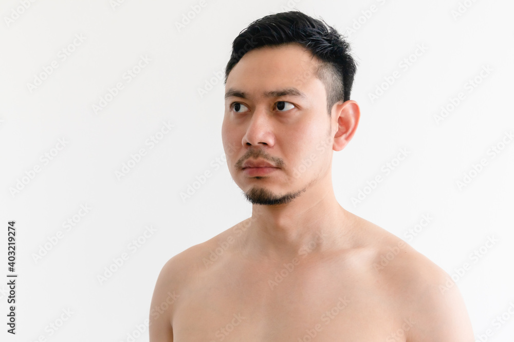 Portrait of topless Asian man with serious face on isolated background. Portrait of topless Asian man with serious face on isolated background.