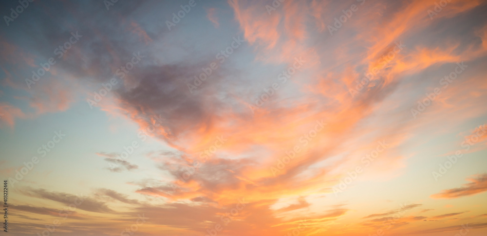 Stunning view of a dramatic sky with clouds at sunset. Natural background, wallpaper or preset with copy space. Stunning view of a dramatic sky with clouds at sunset. Natural background, wallpaper or preset with copy space.