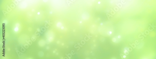 Spring background - abstract banner - green blurred bokeh lights - 