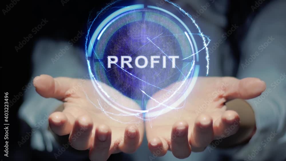 Female hands show a round conceptual hologram with text Profit. Unrecognizable woman in ashen white on a black background with future holographic technology Female hands show a round conceptual hologram with text Profit. Unrecognizable woman in ashen white on a black background with future holographic technology