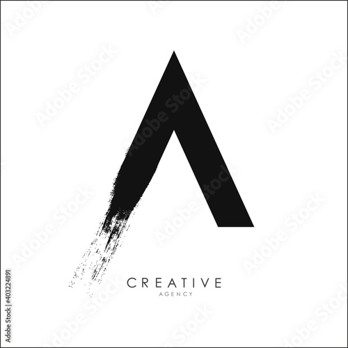 A Brush Stroke Letter Logo Design. Black Paint Logo Letter Icon with Elegant Vector Design.