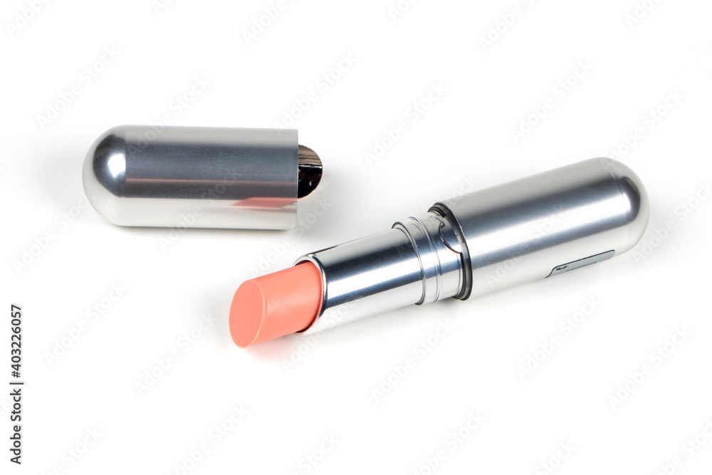 Single opened pastel pink lipstick isolated on white background Single opened pastel pink lipstick isolated on white background