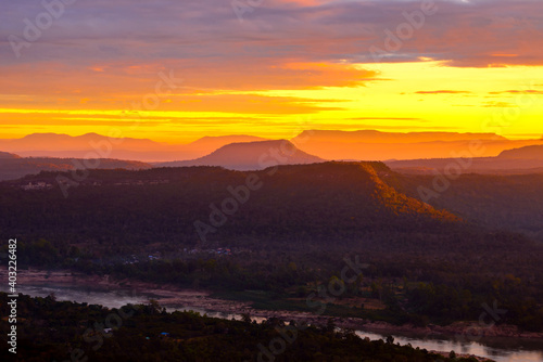Colorful sunset over mountain and river,Pha Chanadai Cliff,Phataem National Park,Ubon Ratchathani,Thailand,ASIA.