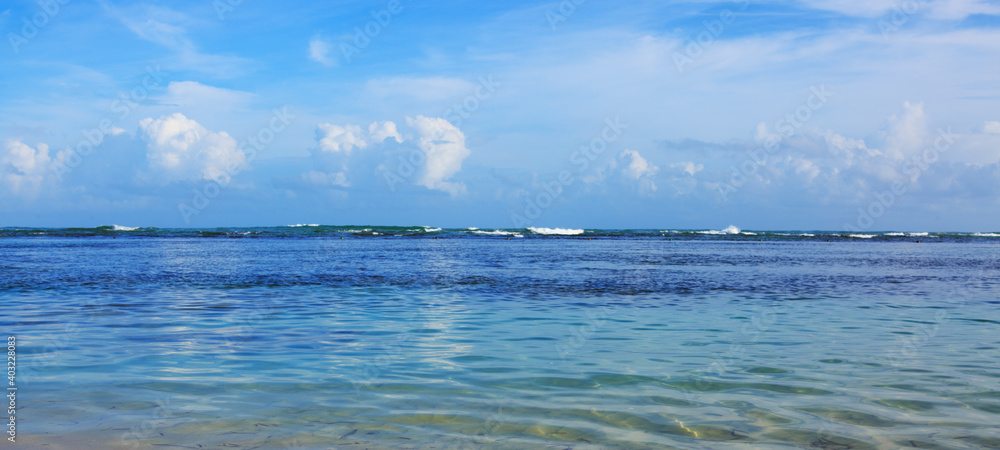 Caribbean sea and blue sky background. Travel background.