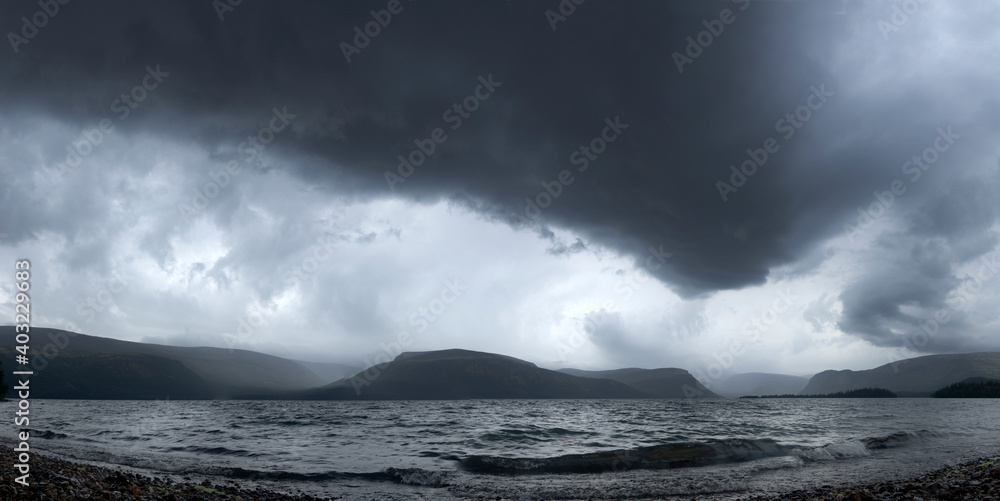 Panorama. Thunderstorm over the lake. Mystical Seydozero, Murmansk region.