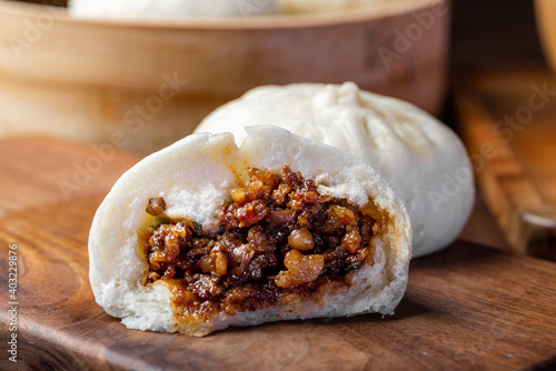 Chinese breakfast. Steamed buns and porridge are on the table