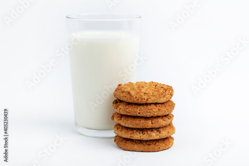 delicious cookies and a glass of milk. Isolated on white background

