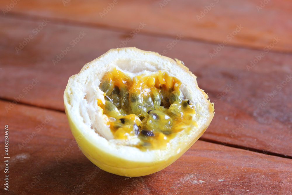 Passion fruit is an edible fruit with sour taste and rich in vitamins.