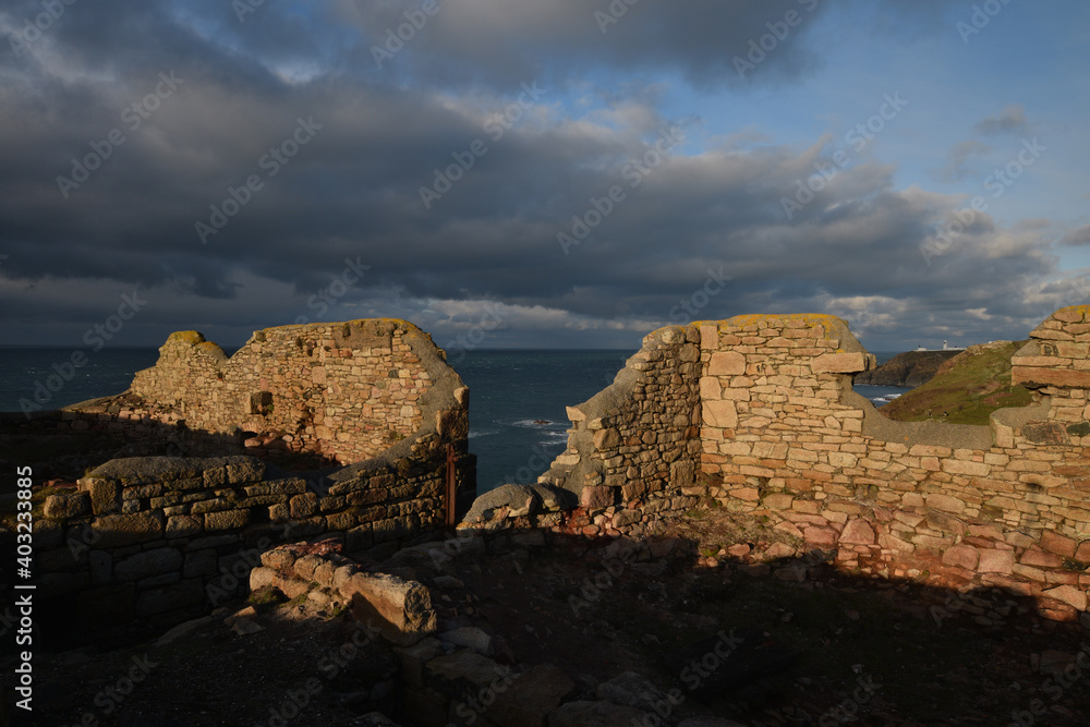 The ruins of Levant tin mine Cornwall at sunset