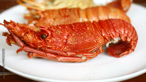 Boiled lobsters on white plate. photo