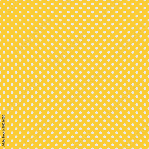 seamless white polka dot pattern on yellow background. simple fashion texture.