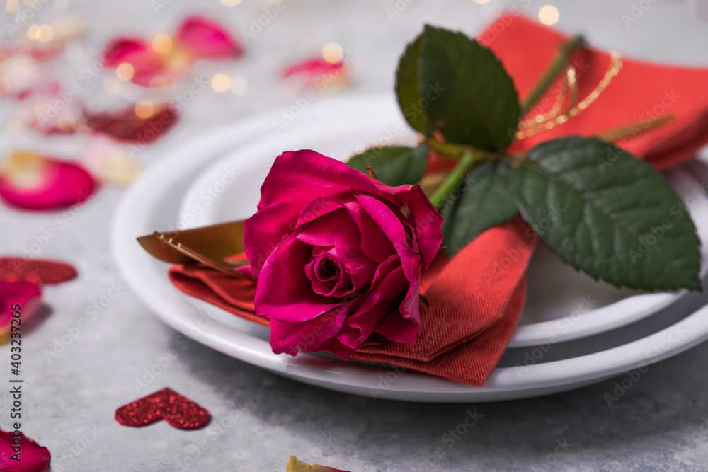 Valentines dinner with table place setting hearts decoration, rose for valentines days dinner. View from above. Valentines dinner with table place setting hearts decoration, rose for valentines days dinner. View from above.
