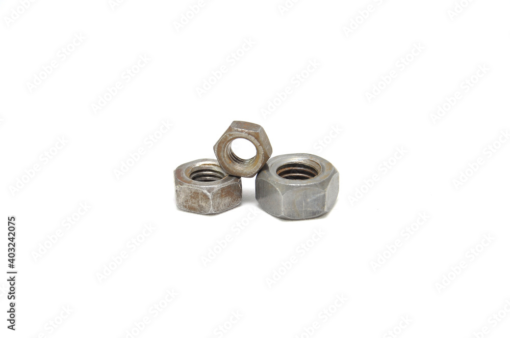 Rusty nuts on white background close-up. engineering, industry, technology
Rusty nuts on white background close-up. engineering, industry, technology
