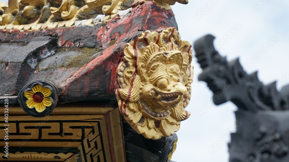 Balinese temple ornament with a combination of gold and black