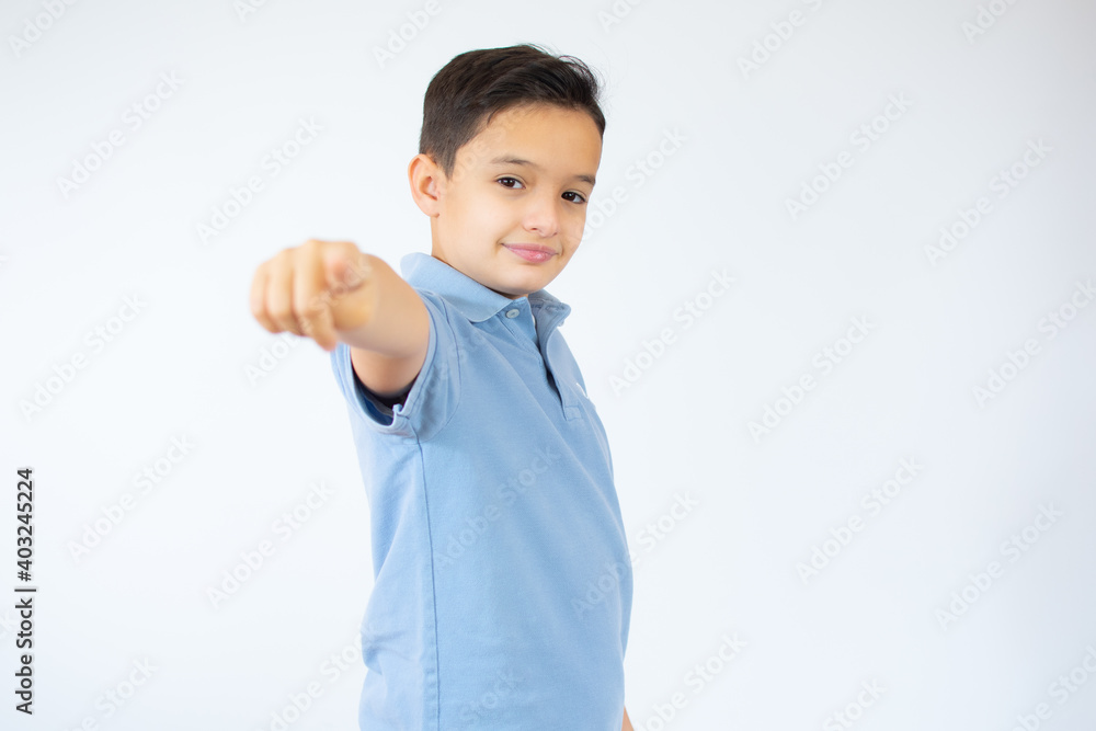 young caucasian boy with thumb up over white background young caucasian boy with thumb up over white background