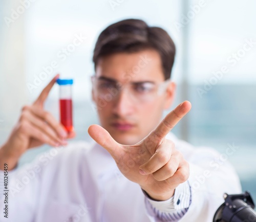 Male chemist working in lab