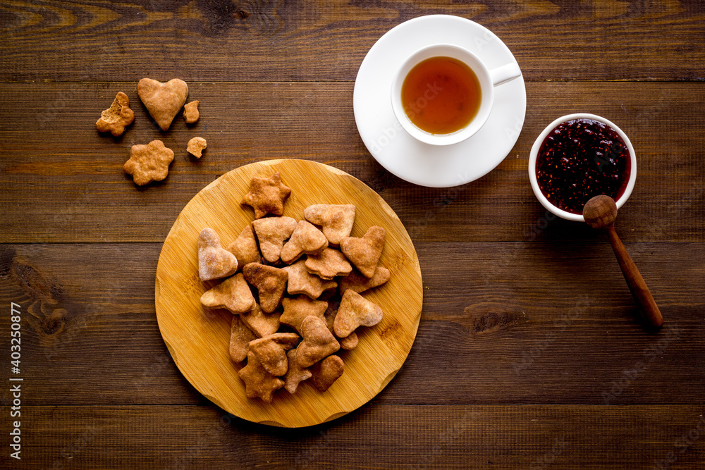 Fototapeta premium Breakfast with cookies berry jam and tea