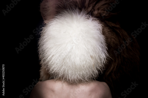 person in fur hat