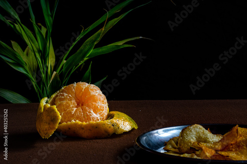 Orange fruit peeled and kept on the table