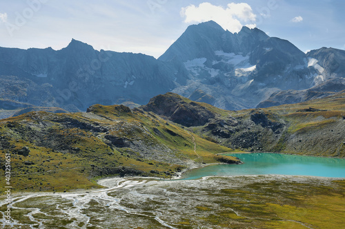 Lac blanc with Pointe de l'Echelle (3422m) and glacier de la Masse at background, Vanoise national park, France