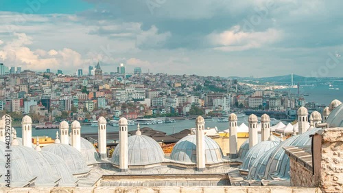 Timelapse Roof of the Grand Bazaar, Sulemaniye mosque and Beyazit tower in Istanbul, Turkey. photo