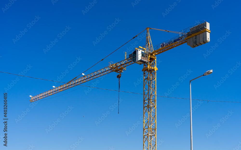 construction crane against blue sky no person construction crane against blue sky no person