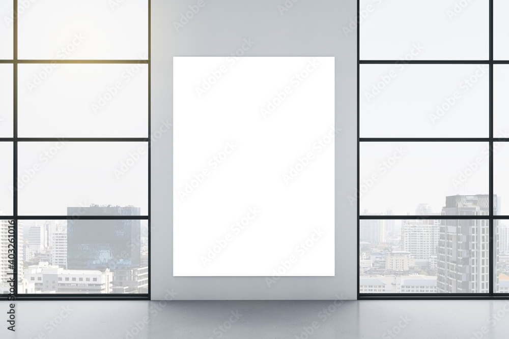 Gallery interior with empty poster on wall and city view