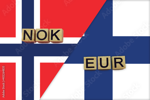 Norway and Finland currencies codes on national flags background