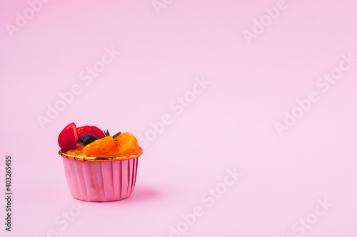 Mini paper cup of fruit or ...