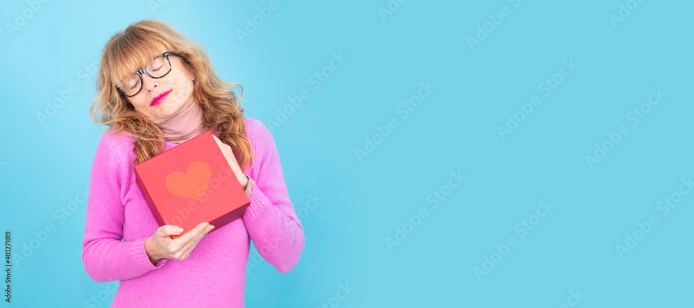 senior woman with valentine gift box senior woman with valentine gift box