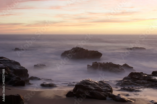 Rocky beach at dusk