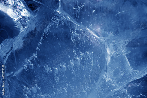 Photography beautiful blue ice with cracks. frosty background