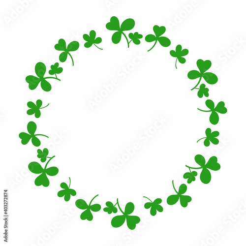 Round frame with clover leaves.Magical plant. Decoration for St. Patrick's Day with trefoils and quatrefoils. Shamrock. Irish story. Isolated on white.