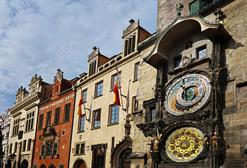 Photography The glockenspiel and colorful buildings of Prague Old Town square