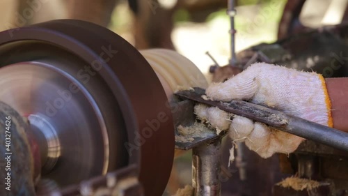 Turning and grinding with machines for bamboo processing.
