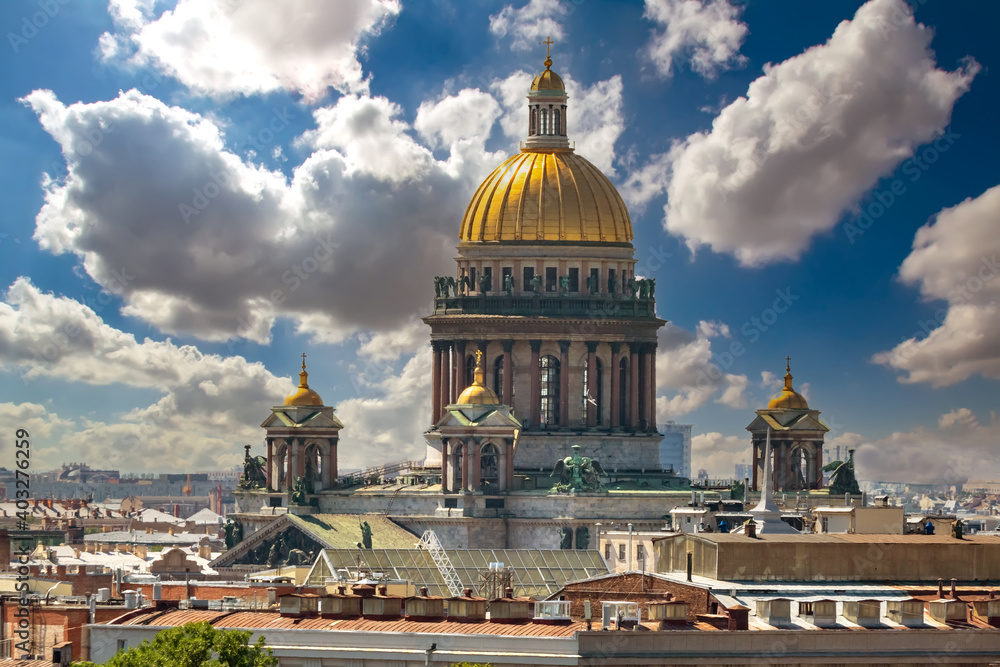 The dome of St. Isaac Cathedral against a beautiful sky. Roofs Of Saint- Petersburg. Cities of Russia. Architecture Of Petersburg. Cathedrals Of Petersburg. Panorama of the Russian city from a drone.