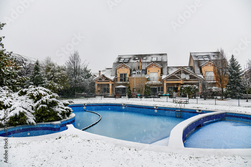 Snow covered yard in a beautiful neigborhood in Bucharest.Christmas landscape