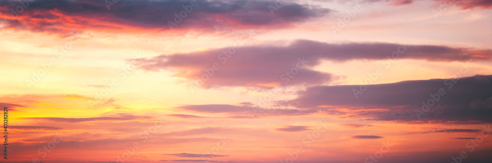 Bright beautiful sunset sky with clouds abstract natural background and texture